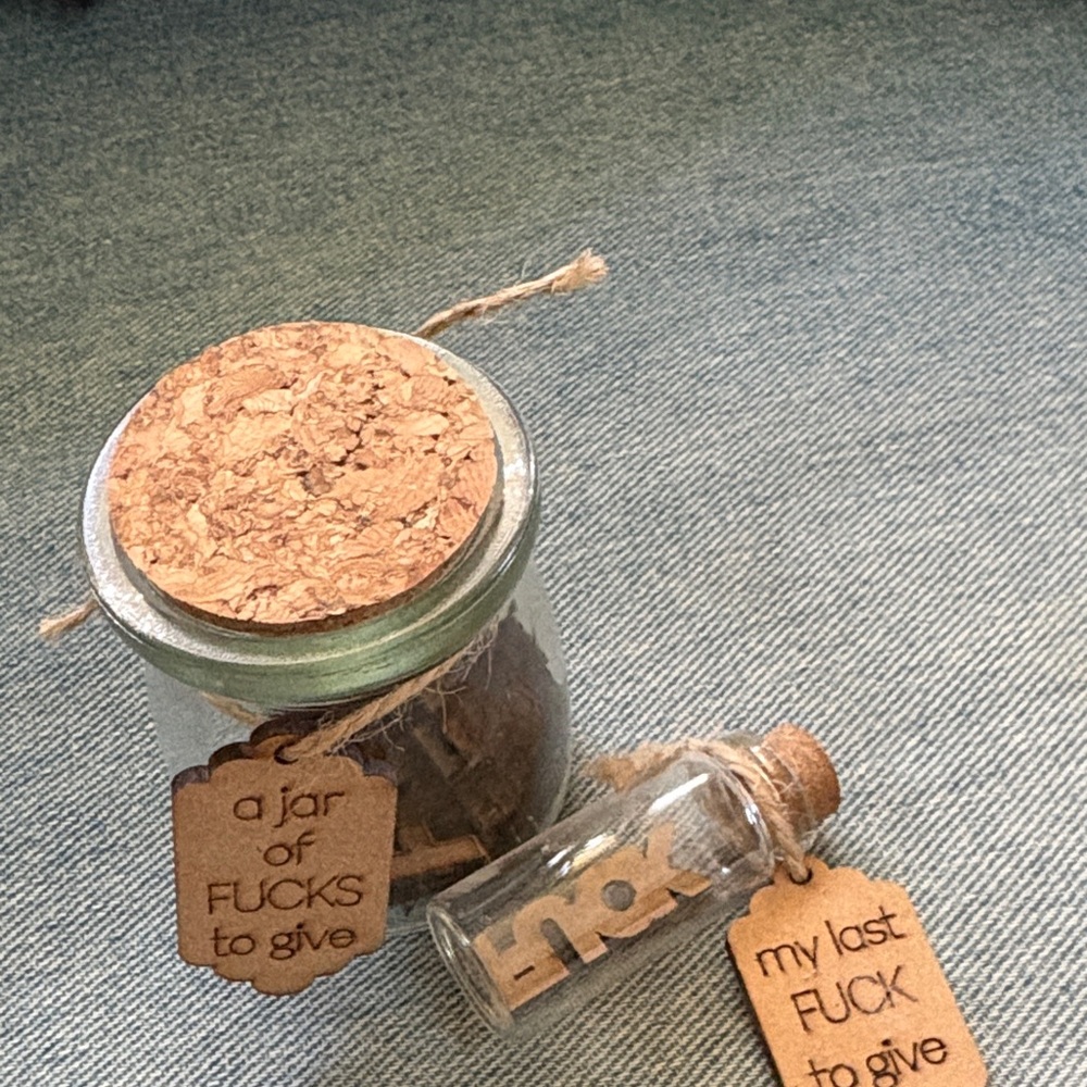 Silly jar of “ _UCKS “ to give